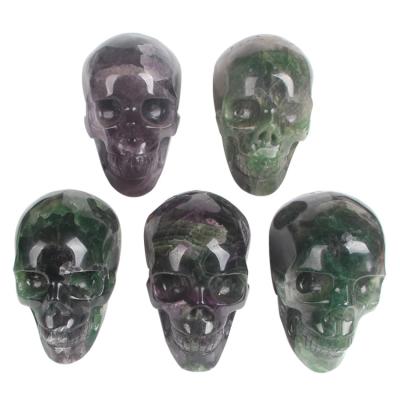 China China Wholesale High Quality Natural Rainbow Fluorite Hand Carved Quartz Crystal Skulls for sale