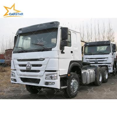 China Used HOWO Manual Tractor Truck 6X4 Sino Howo Good Quality Used Truck Tractor Units 6800x3668x2490mm for sale