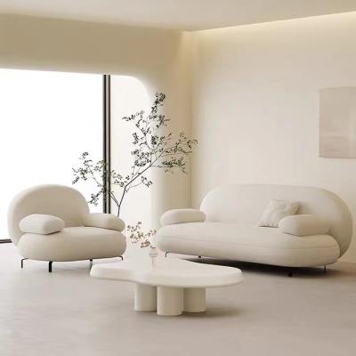 China Other Small Apartment Hair Salon Sand Double Bed Style Blowing Light Cream Red Luxury Clothing Store Sofa Sitting Area for sale