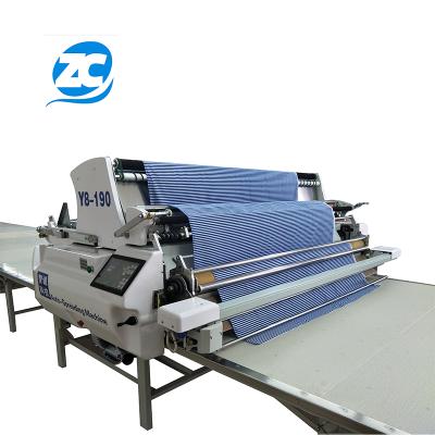 China Garment Shops Automatic Fabric Spreading Machine Applicable For Knitting And Woven Automatic Textile Cloth Spreader Machine for sale