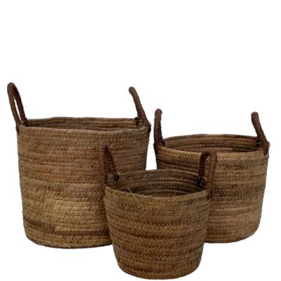 China Sustainable New design Handmade natural  round banana leaf craft basket for Storage with Carrying Handle Decor for sale