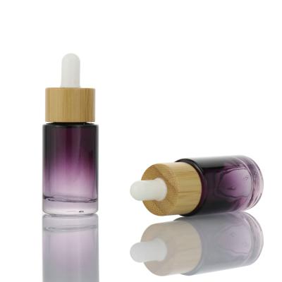 China Wholesale Cosmetic Glass Dropper Bottle Essential Oil Bottle CBD Glass Bottle With Bamboo Lid for sale