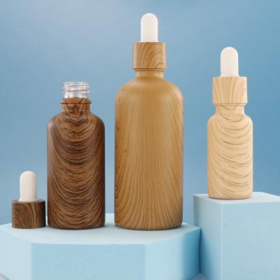 China Personal Care 5ml 10ml 15ml 20ml 30ml 50ml 100ml Bamboo Essential Oil Bamboo Bottle Dropper Bottle With Pipette for sale