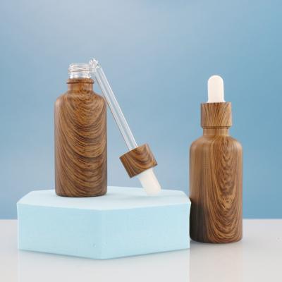 China LANJING Personal Care Package Factory Hot Sale Essential Oil Tube Glass Dropper Luxury Bamboo Bottle With Bamboo Cap for sale