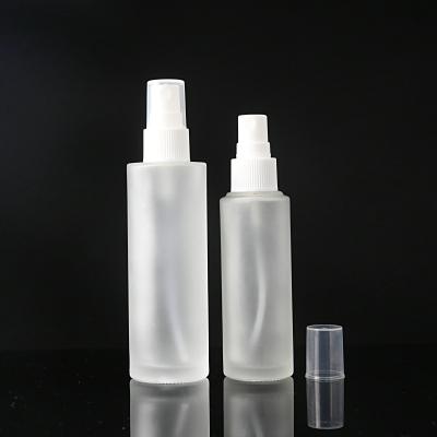 China Cosmetic Wholesale50ml 100ml Pink Blue Frosted Round Hairspray Bottle Perfume Mist Spray Glass Bottle for sale