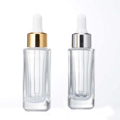 China Essential Oil Empty Transparent Square Bottle Portable Cosmetic Dropper Bottle for sale