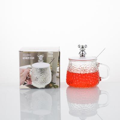 China Beverage 420ml glass cup with handle  bear shape glass jar with plastic lid Ins best selling glass cup for sale