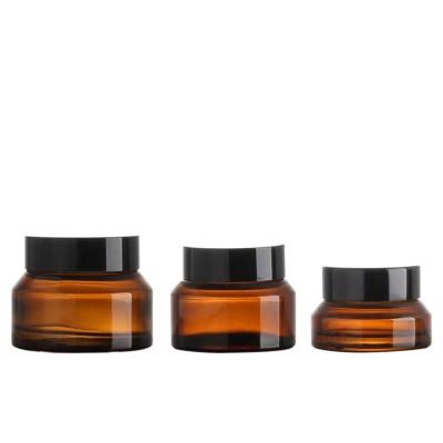 China Cosmetic hot sale 15g 30g 50g amber glass oblique shoulder glass cosmetic bottle Glass Cosmetic Jar for sale