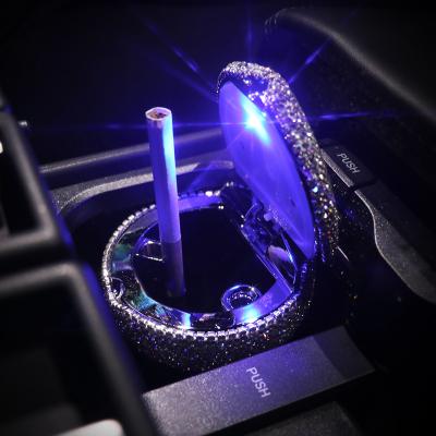 China Portable LED Light Car Ashtray With Diamond Led Auto Ash Tray Storage Cup Holder Black Light Rhinestones For Girls Woman for sale