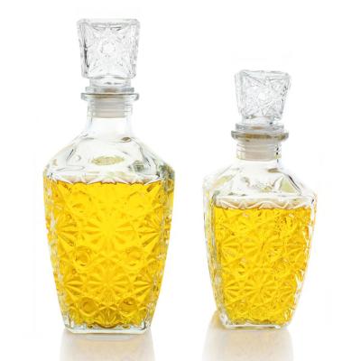 China Wholesale Decorative Blown Glass Beverage Whiskey Wine Bottle Vodka Liquor Fancy Bottle For Liquor for sale