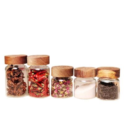 China Food High Borosilicate Air Tight Storage Jars Containers With Acacia Wood Lid Glass Jars for sale