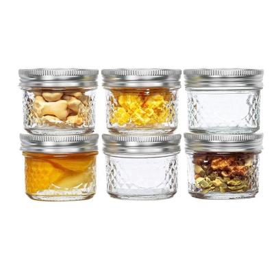 China Wholesale 4 Ounce Mini Crystal Mason Jars Wide Mouth Jam Caviar Stocked Jars With Airtight Lids for sale