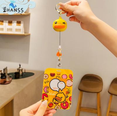 China Jewelry Little Duck Head Retractable Premium Cute Yellow Duck Head Key Chain Resin Metal Design Keychain Girl's Key Chain for sale