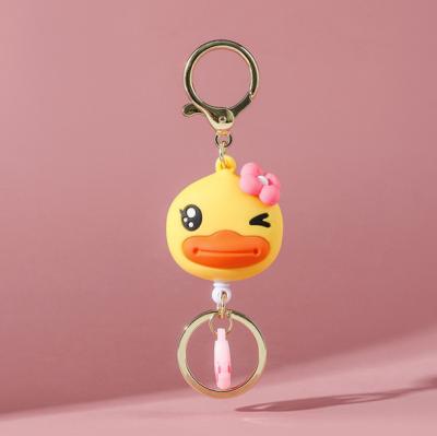 China Anime Duck Girlfriend Retractable Key Chain Pendant Car Ornaments Gift Cute Little Duck Yellow Car Doll Key Chain for sale