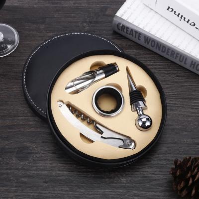 China 4pcs Stainless Steel Viable Wine Opener Round Leather Box Wine Kits Cork Pourer Tool Red Wine Bottle Opener Set for sale