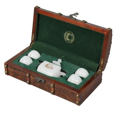 China Handmade DS Restoring Antique Patter Solid Basswood Laser Engraving Wooden Tea Set Packaging Box for sale