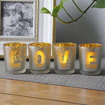 China Electroplated Matte Glass Candle Holders With Morden Pattern for sale