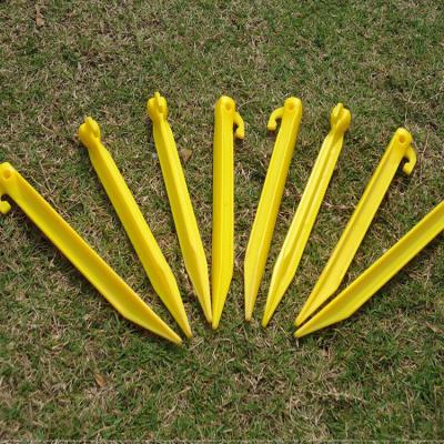 China Eco-friendly 18cm Outdoor Ultralight Camping Tent Stakes Plastic Ground Pegs Nails for sale