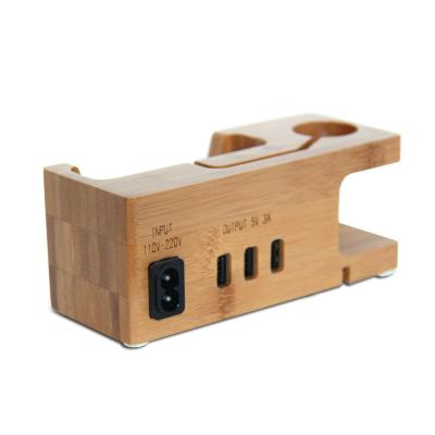 China Universal Phone Holder Multi-Function 2 in 1 Bamboo Wooden Charging Phone and Watch Stand Holder Docking Station for sale