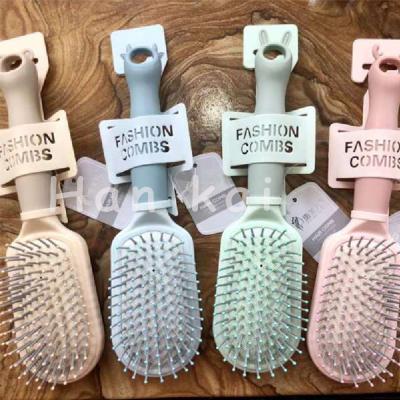 China Home Hot Selling Amazon Logo Custom Airbag Comb Plastic Hair Brushes Comb Massage For Women for sale