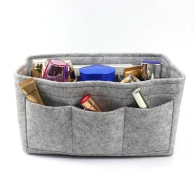 China Stored Custom Held Storage Bags Felt Insert Bag Organizer For Travel for sale