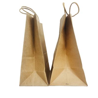 China Recyclable Wholesale Customized Logo With Rope Food Grade Brown Kraft Paper Handheld Bags for sale