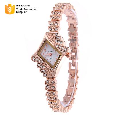 China King girl-9097 fashion horseshoe bracelet ladies oblique buckle head mounted gold ladies bracelet watch for sale