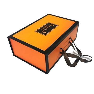 China Elegant Folding Gift Voucher Service Voucher Festival Handmade Daily Necessities Clothing Orange Cardboard Box With Magnet Closed Bulk for sale