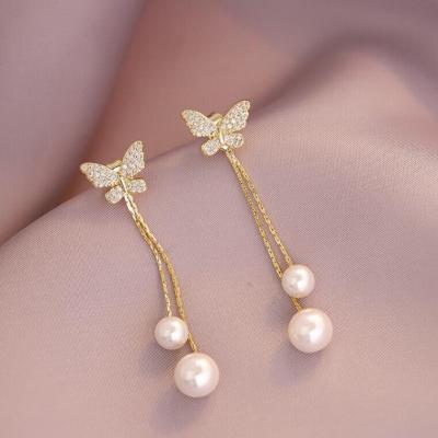 China New Style FASHIONABLE Butterfly Pearl Long Crystal Earrings Simple Fashion Pearl Earrings for sale