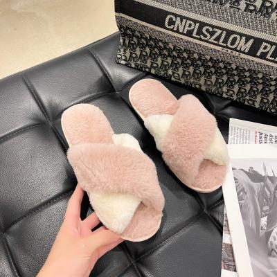 China Fashion Trend Winter Faux Fur Indoor Warm Slippers Soft Plush Cross Hairy Slides For Women for sale