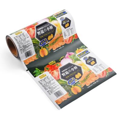 China Custom Printing Moisture Proof Snack Food Packaging Laminate Film Packaging Plastic Roll Film for sale