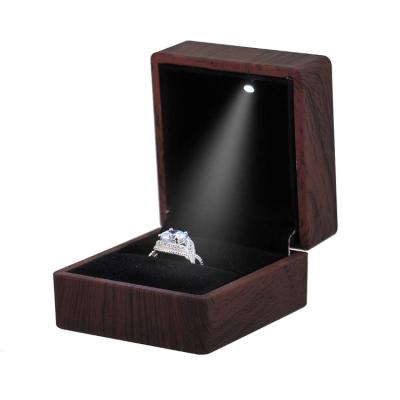 China Wooden Nifty Magnetic Jewelry Storage Walnut Gift Ring Box With Led Light for sale