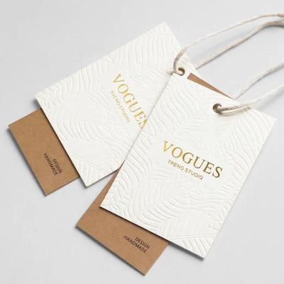 China Free Design Viable Factory Direct Sales Customized Apparel Textured Seed Logo Label Hang Tags For Apparel en venta