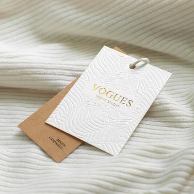 China Custom Embossed Name Logo Recycled Seed Foil Print Sustainable Free Sample Luxury Textured Paper Hang Tags For Apparel Te koop