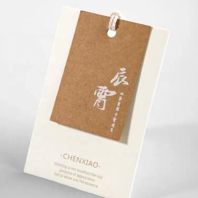 China Viable High Quality New Design Clothes Hang Tag Garment Hair Hang Tag Hair Paper Hang Tag for sale