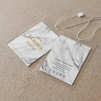 Китай Good Quality Sustainable Custom Plastic Paper Tags Garment Hangtags For Clothing Own Logo Hair Hangtag продается