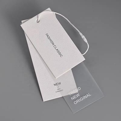 China Viable Custom Gold Plastic Hang Tag Stamping Hang Tags Fashion Jeans Hang Tag For Clothing en venta