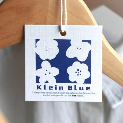 China Viable New Design Blue Flower Custom Clean Fashion Swing Hang Logo Product Square Paper Hangtags Clothing Label Garment Tags for sale