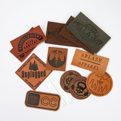 中国 Washable Custom PU Leather Patches Custom Leather Labels Iron On Patch Hats Baseball Leather Patch 販売のため