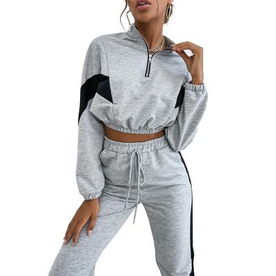 China OEM Breathable Apparel Women Mid Wholesale Manufacturer Spliced ​​High Zip Up Neck Tracksuit Women Two Piece Set Long Sleeve Cropped Top for sale