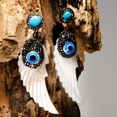 China Trendy Unique Design Statement Party Wedding Evil Eyes Shell Earring Fashion Trendy Statement Earrings For Women for sale