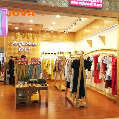 China Simple Concise Lady Garment Indoor And Outdoor Store Retail Decor Interior Design for sale