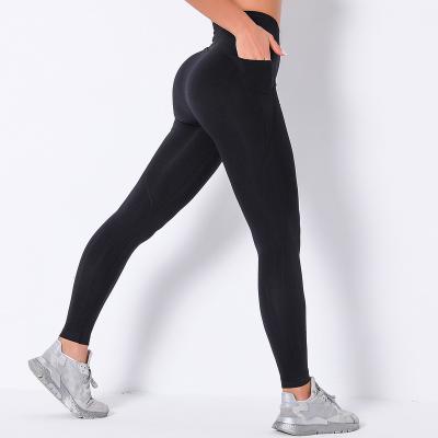 China New Hip Yoga Seamless Washable Quick Dry Sexy Fishing Jogging Pants With Pocket Sports Fitness Gaiters Outdoor Recycling Women for sale