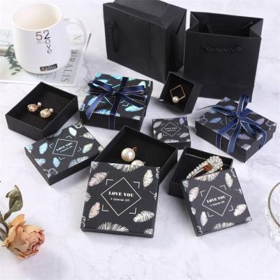 China Hot Selling Logo Printed Bowknot Jewelry Packaging Box Earrings Necklace Recyclable Custom Jewelry Box for sale