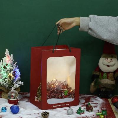 China Wholesale Custom Logo Printed Recyclable Christmas Gift Kraft Handle Shopping Brown Twisted Paper Bag With Window for sale