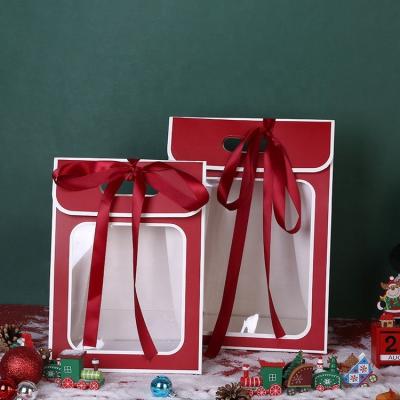 China Custom Recyclable Wholesale Paper Logo Shopping Bags Christmas Paper Bags For Gift With Window Ribbon for sale