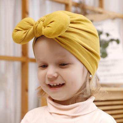 China Wholesale Skin Friendly Baby Kids Warm Cotton Turban Hair Wrap Head Band Twisting Hat Toddler Ear Cap for sale