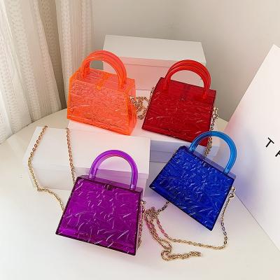 China Newest Ice Ripple Trapeze Clear Pattern Split Mini Bag Transparent Crossbody Party Acrylic Purse for sale