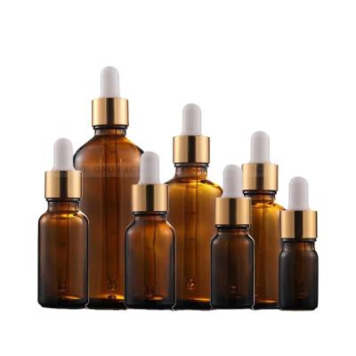 China Amber Essential Oil Bottle 50ml Empty Cosmetic Glass Dropper Bottles Glass Dropper Bottle for sale