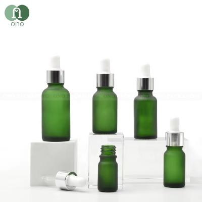 China ONO Wholesale 10ml 20ml 30ml 50ml 100ml Matte Frosted Green Glass Essential Oil Bottle Cosmetic Dropper Bottle for sale